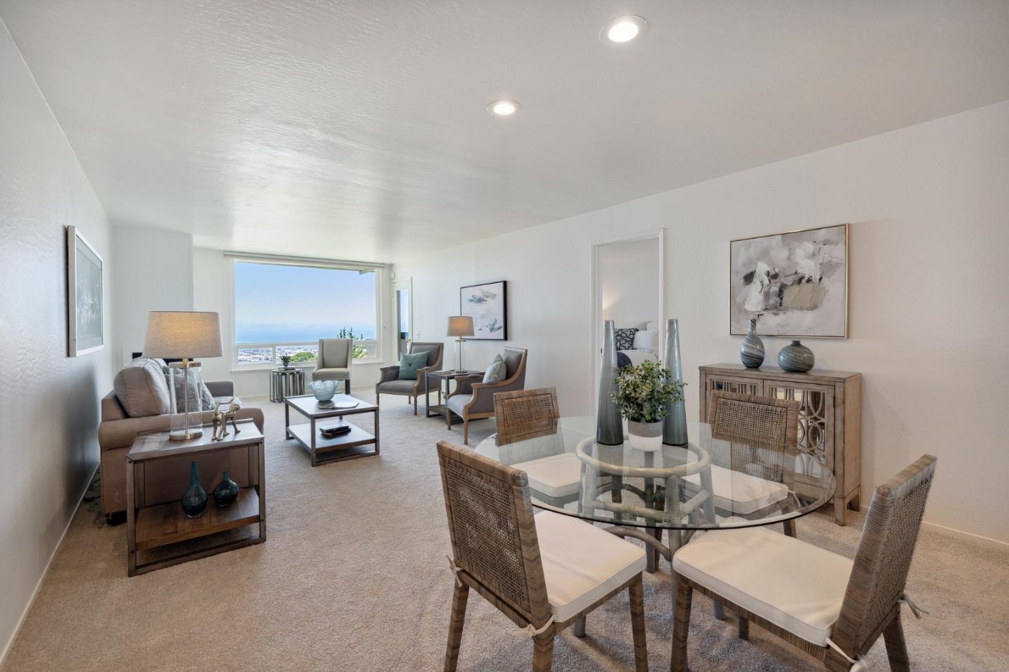 360 Vallejo Drive, Unit 113 Millbrae, CA 94030 - Photo 17 of 34 a living room with furniture and wooden floor