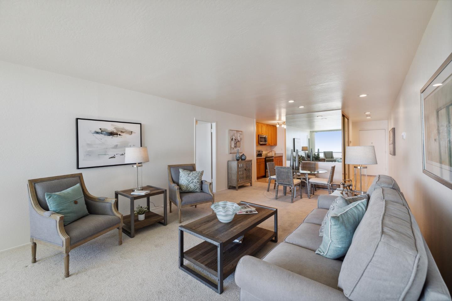 360 Vallejo Drive, Unit 113 Millbrae, CA 94030 - Photo 19 of 34 a living room with furniture kitchen and a table