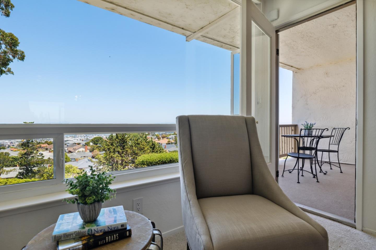 360 Vallejo Drive, Unit 113 Millbrae, CA 94030 - Photo 20 of 34 a balcony with furniture and a potted plant