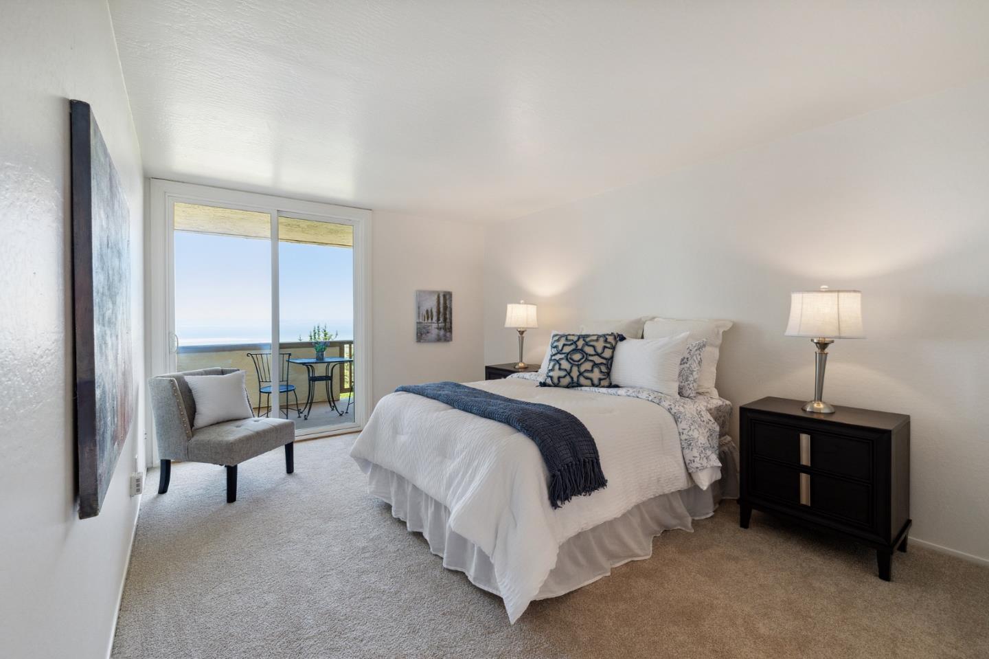360 Vallejo Drive, Unit 113 Millbrae, CA 94030 - Photo 24 of 34 a spacious bedroom with a bed and a large window
