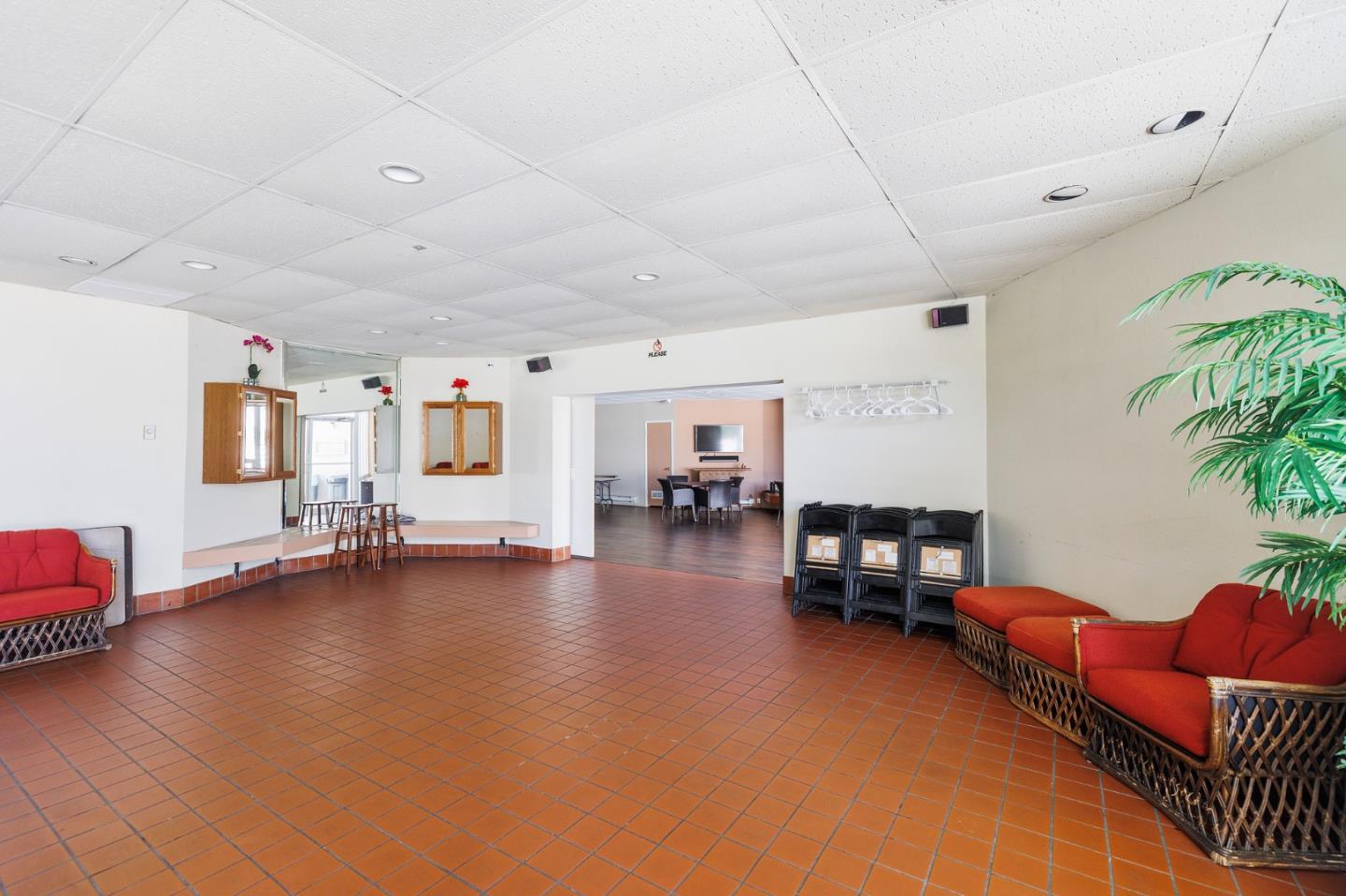 360 Vallejo Drive, Unit 113 Millbrae, CA 94030 - Photo 33 of 34 a living room with furniture and a wooden floor