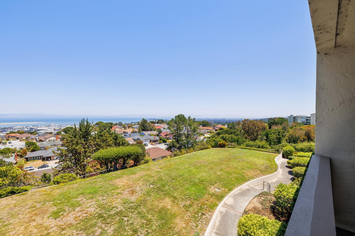 360 Vallejo Drive, Unit 113 Millbrae, CA 94030 - Photo 4 of 34 a view of a swimming pool with a yard