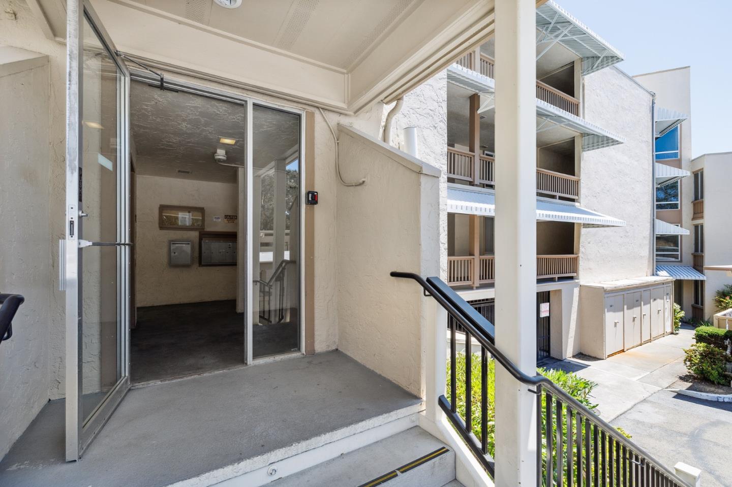 360 Vallejo Drive, Unit 113 Millbrae, CA 94030 - Photo 7 of 34 front view of an entryway with a front door