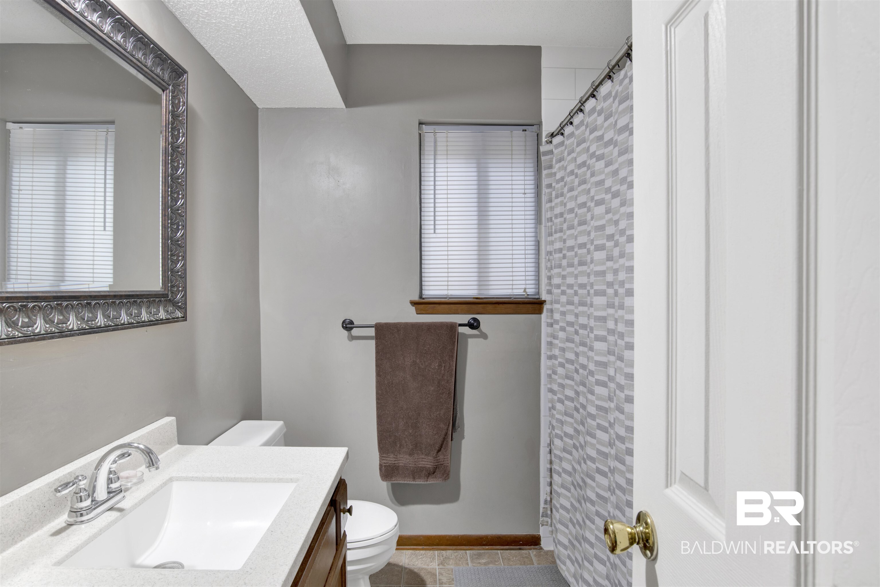 126 Montclair Loop Daphne, AL 36526 - Photo 19 of 25 Bathroom featuring vanity and a shower with shower curtain