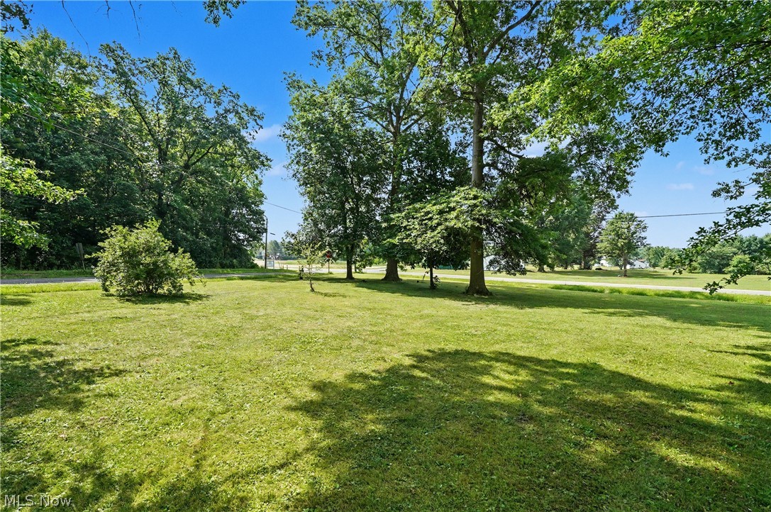 3424 Painesville Warren State Road Southington, OH 44470 - Photo 8 of 50 3424 Painesville Warren Rd, Southington, OH 44470 – Enjoy comfortable one-floor living in this well-maintained home built in 2018. Featuring 3 bedrooms, 2 full bathrooms, and an open-concept layout, this home offers both functionality and convenience. The spacious kitchen, dining, and living areas provide plenty of room for everyday living and entertaining. A large garage offers ample space for vehicles, storage, hobbies, or workshop needs. Situated on a generous lot with a welcoming front porch, this property combines modern living with a peaceful country setting. Move-in ready and waiting for its next owner!