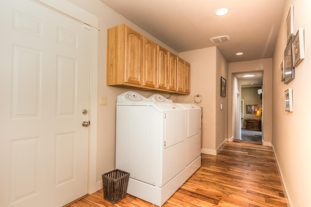 17065 Azusa Road Bend, OR 97707 - Photo 27 of 37 Along the hall is the utility area and a half bath.