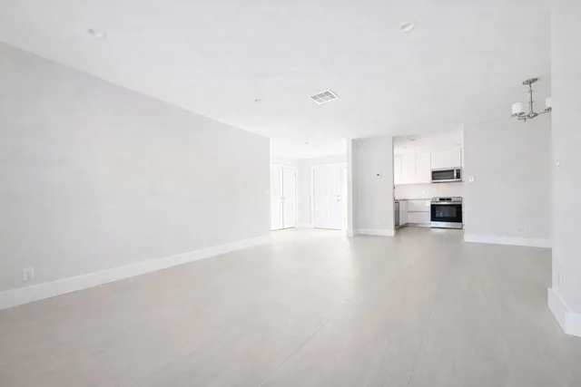 a view of a room with an empty space