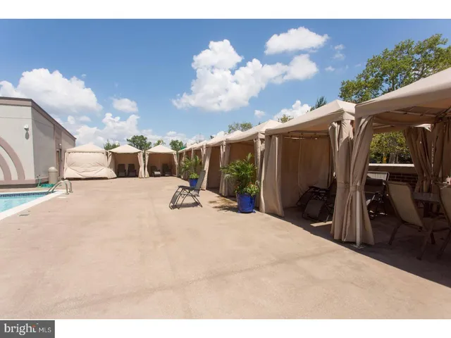 a view of a backyard of the house