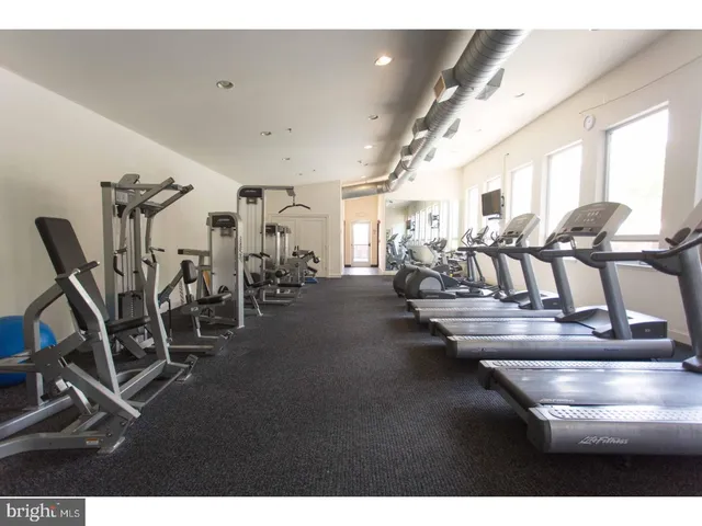 a view of a room with gym equipment