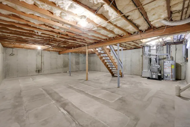 a view of an empty room with stairs