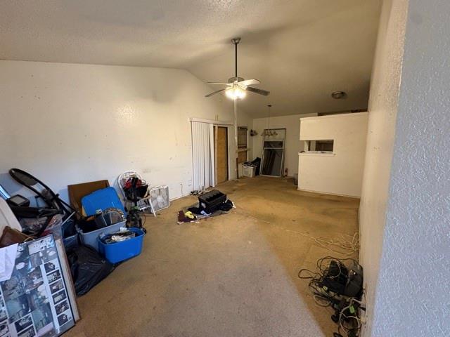 10339 Limestone Drive Dallas, TX 75217 - Photo 2 of 8 a bed room with furniture and a ceiling fan