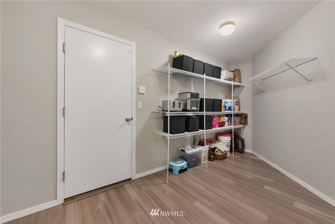 15429 38th Drive Southeast Bothell, WA 98012 - Photo 11 of 26 a view of a workspace with furniture and wooden floor