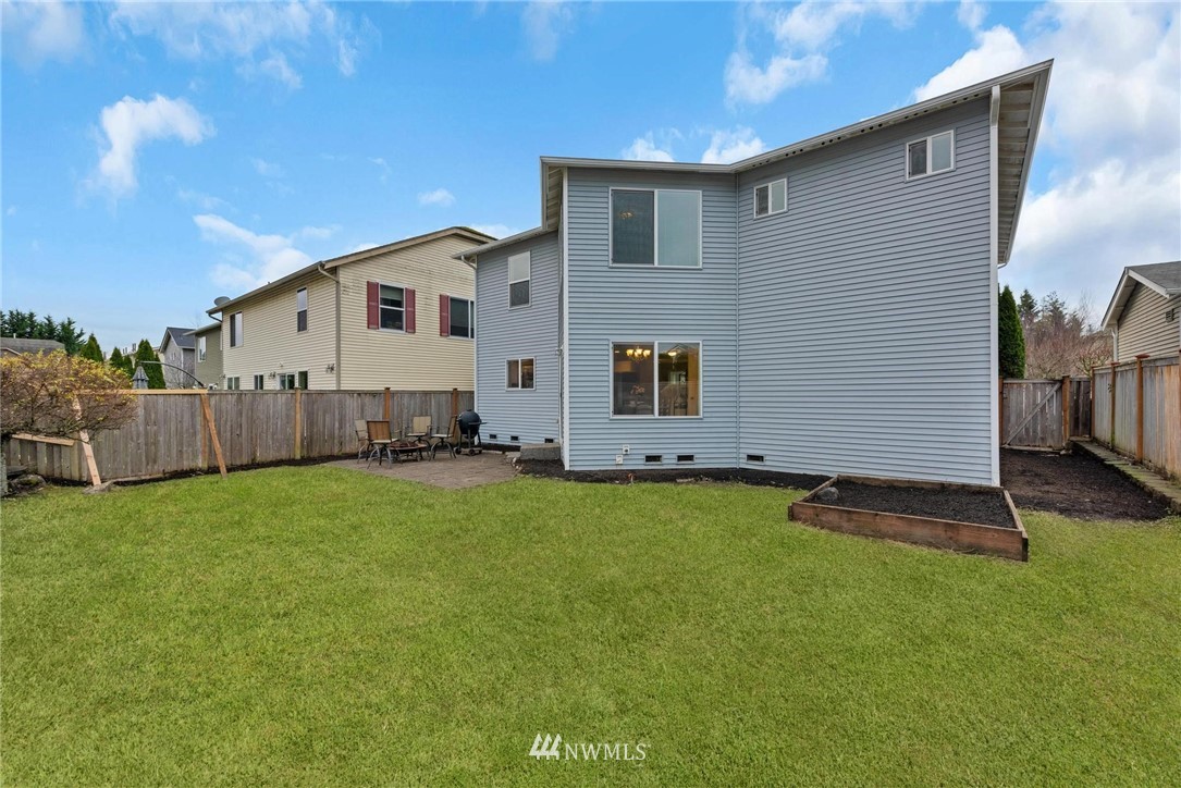 15429 38th Drive Southeast Bothell, WA 98012 - Photo 23 of 26 a view of a backyard with a garden