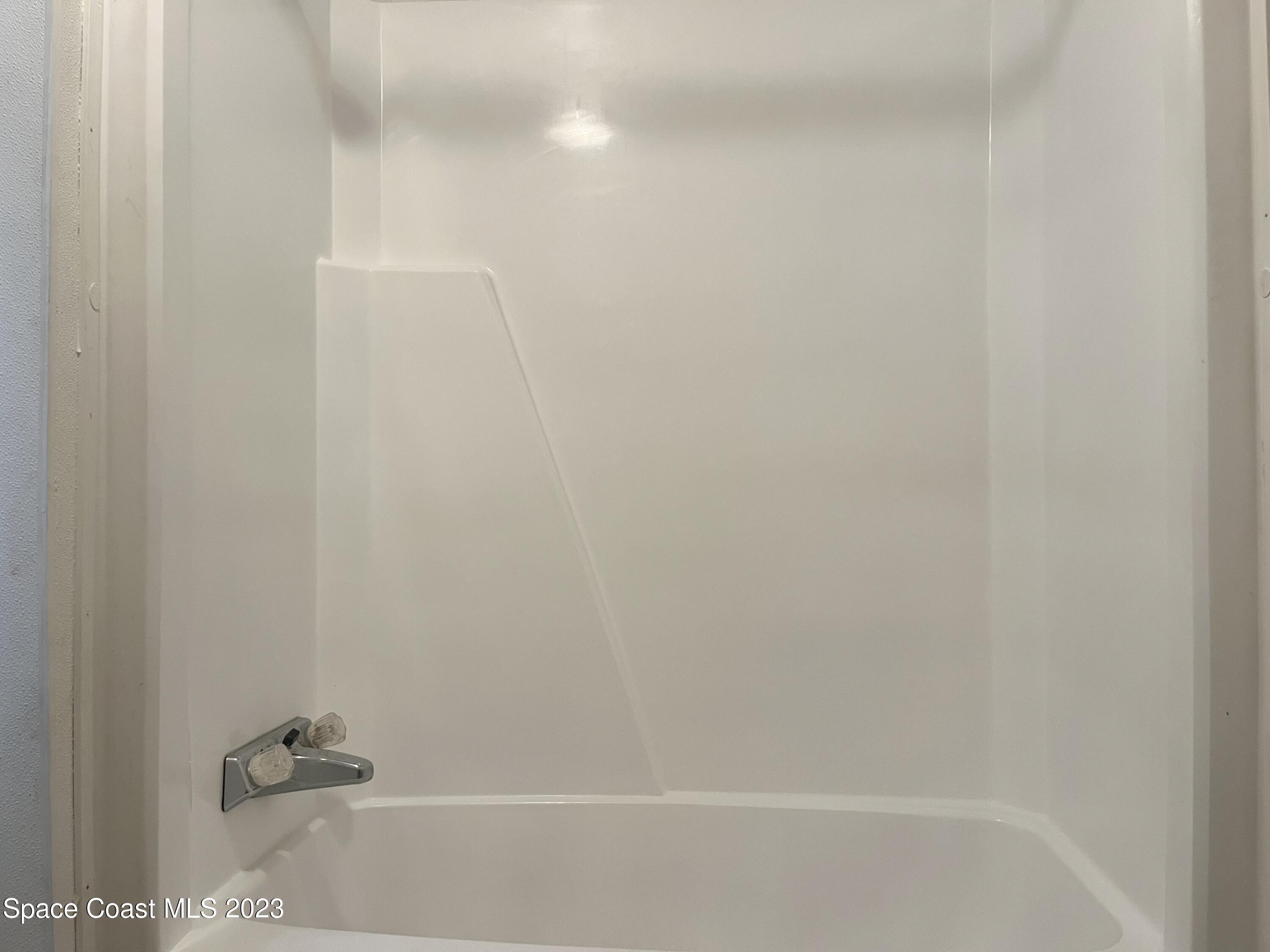 421 Cross Road Cocoa, FL 32926 - Photo 12 of 18 a bathroom with a shower