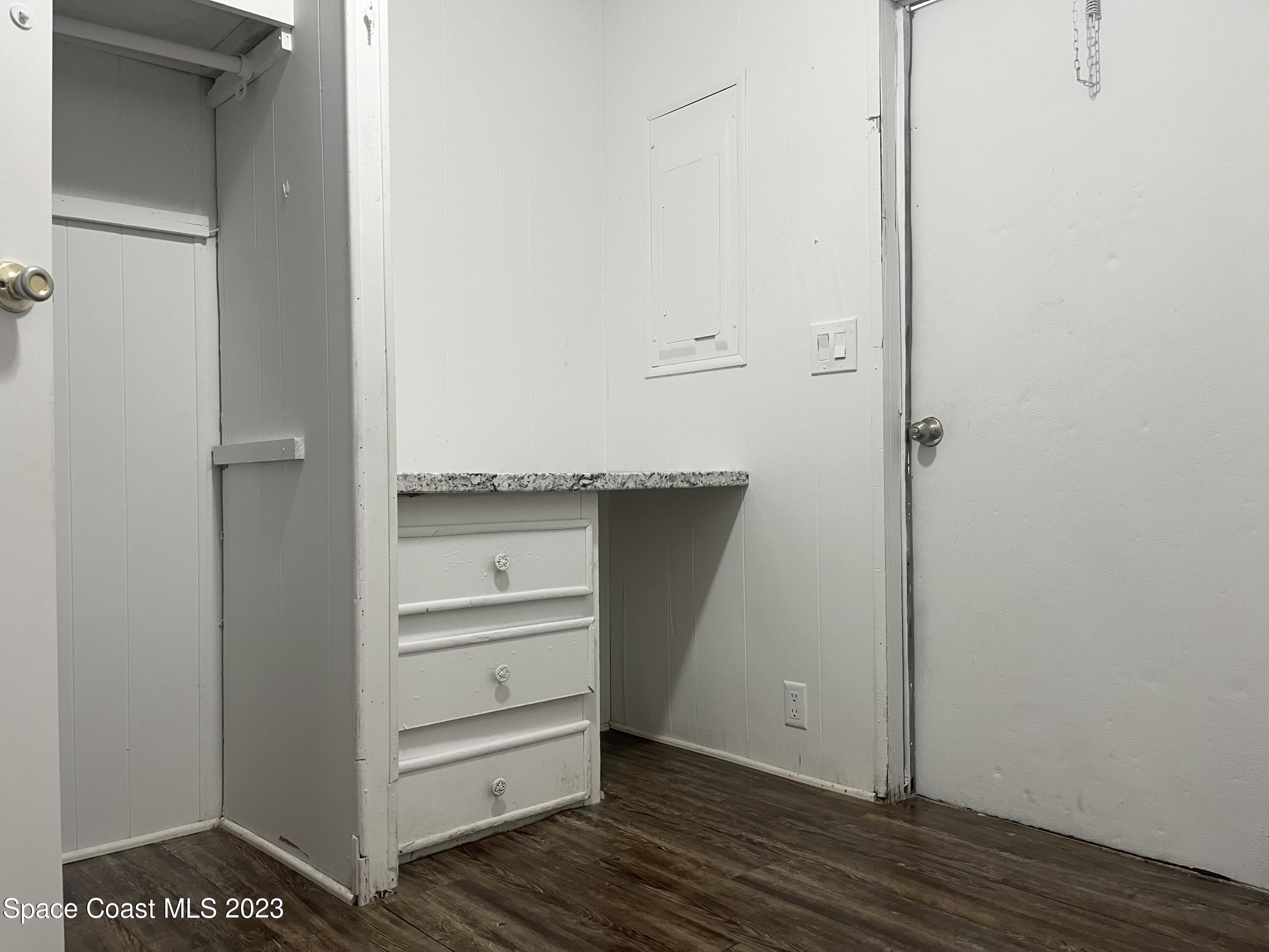 421 Cross Road Cocoa, FL 32926 - Photo 14 of 18 a view of an empty walk in closet