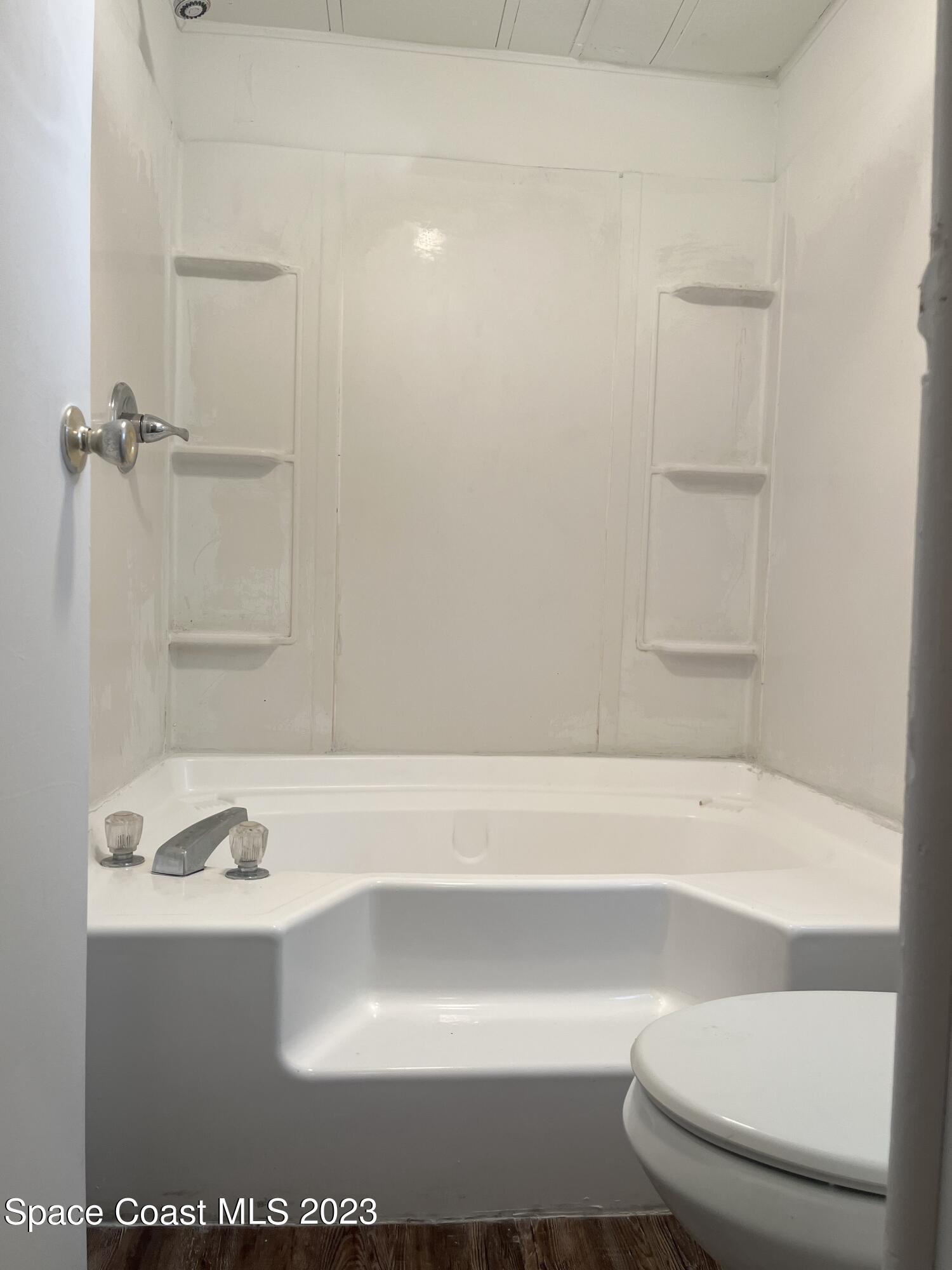 421 Cross Road Cocoa, FL 32926 - Photo 8 of 18 a bathroom with a sink and a toilet