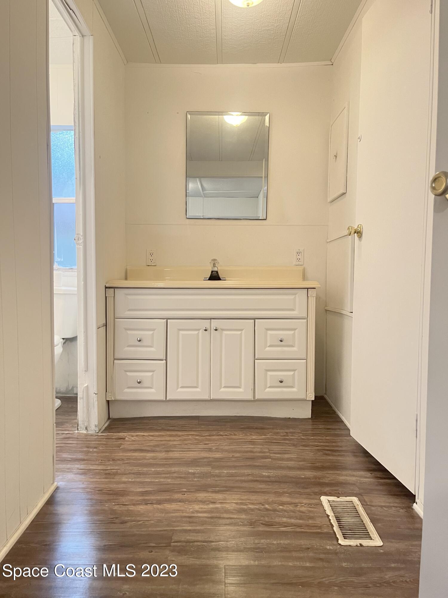 421 Cross Road Cocoa, FL 32926 - Photo 9 of 18 a view of a walk in closet