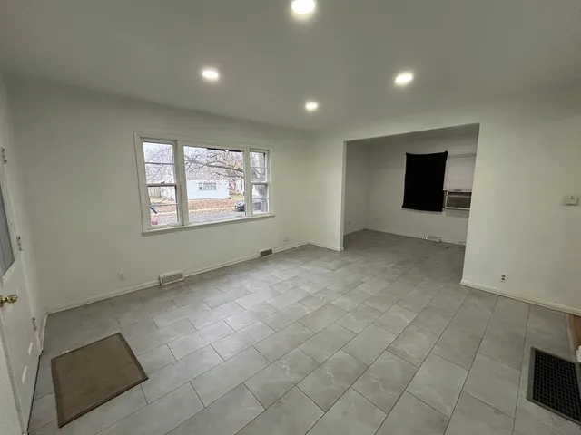 an empty room with windows