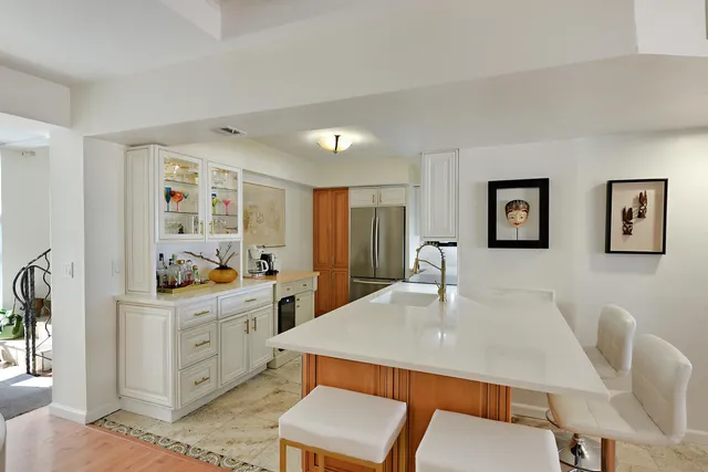 a kitchen with a stove and a microwave