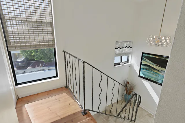 a view of a hallway with washer and dryer