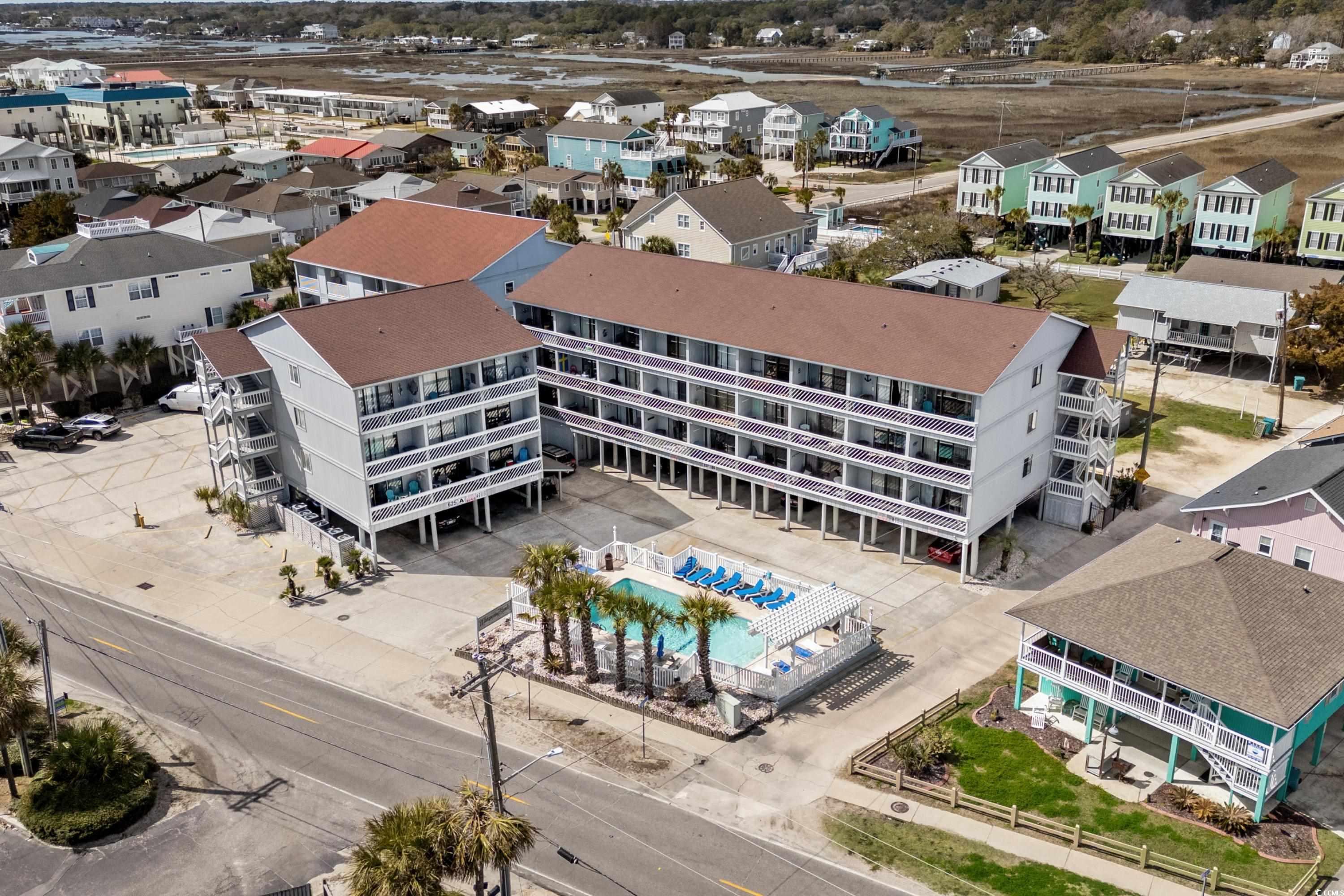625 North Waccamaw Drive, Unit 107 Murrells Inlet, SC 29576 - Photo 28 of 37 Bird's eye view of a pool