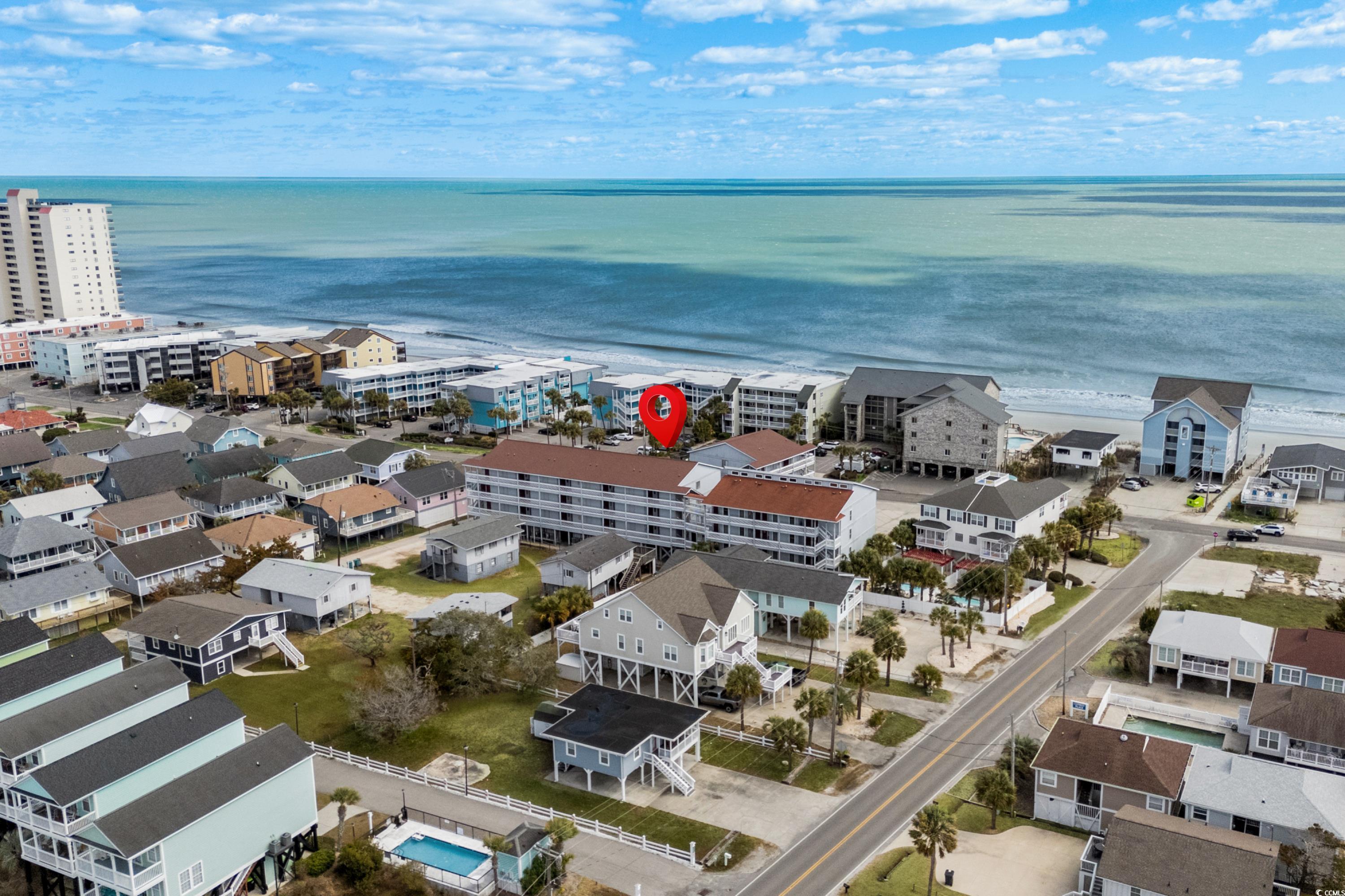 625 North Waccamaw Drive, Unit 107 Murrells Inlet, SC 29576 - Photo 4 of 37 Aerial view of a large body of water