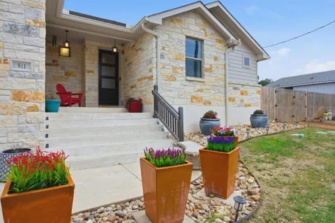 a front view of a house with a porch