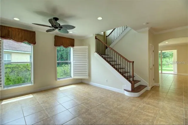 a view of a livingroom with a staircase