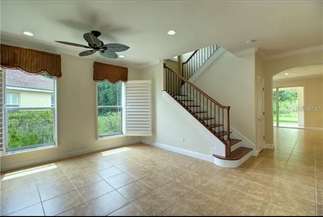 a view of a livingroom with a staircase