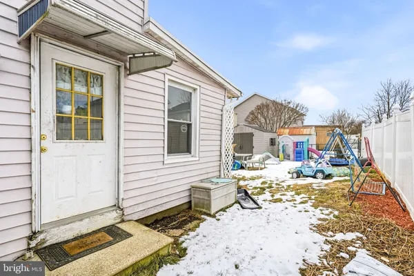 a view of a backyard with a patio