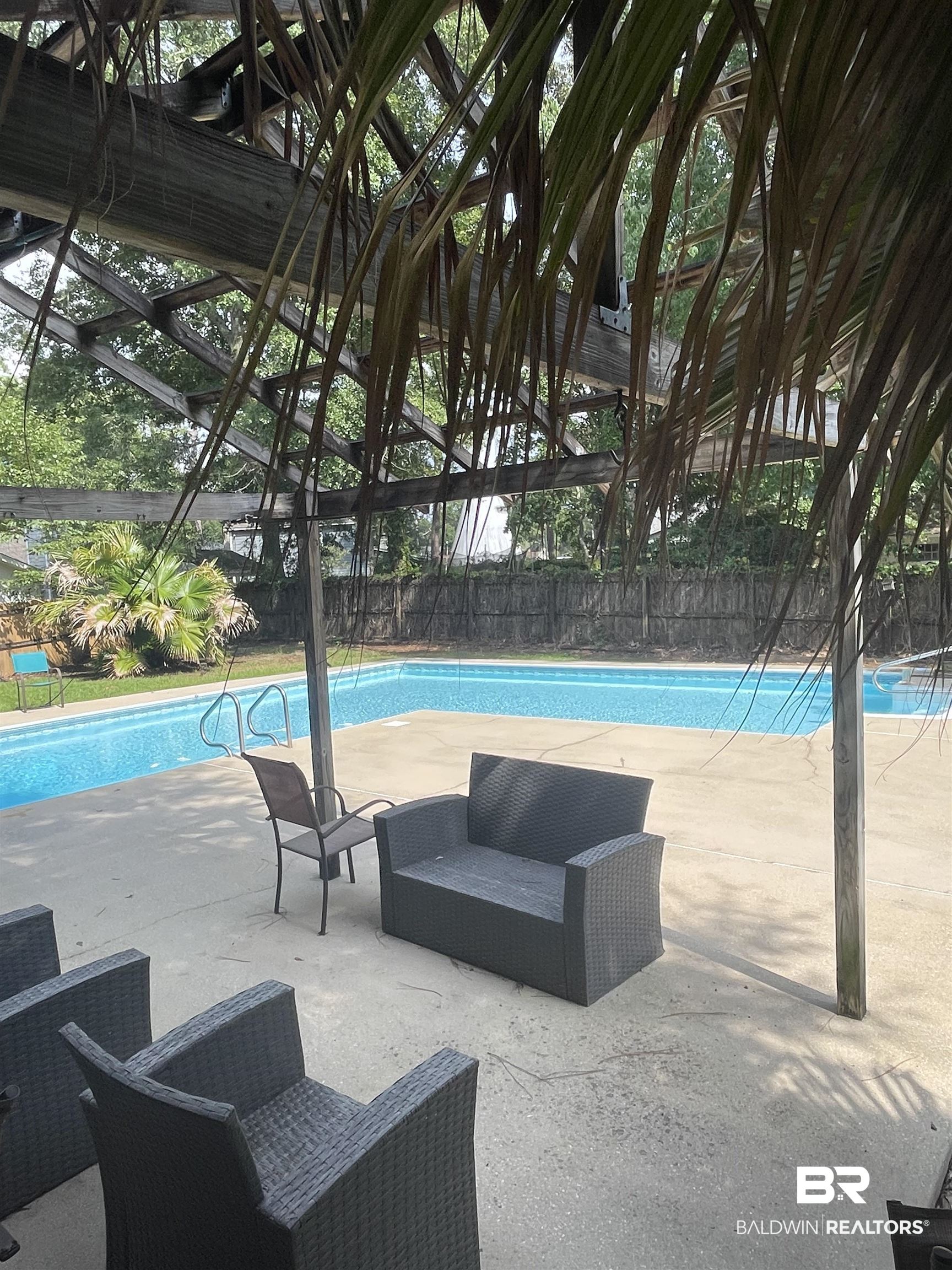 115 Leigh Circle Daphne, AL 36526 - Photo 3 of 12 View of swimming pool featuring a patio