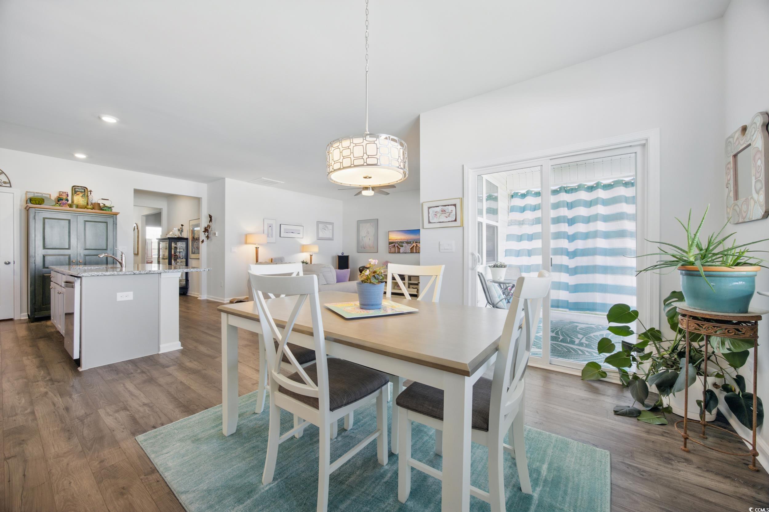 1723 Perthshire Loop Myrtle Beach, SC 29579 - Photo 15 of 34 Dining space featuring dark wood-style flooring, recessed lighting, and baseboards