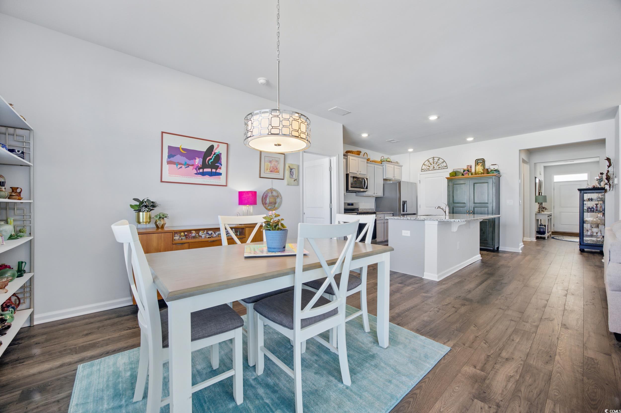 1723 Perthshire Loop Myrtle Beach, SC 29579 - Photo 16 of 34 Dining space featuring dark wood-type flooring, baseboards, and recessed lighting