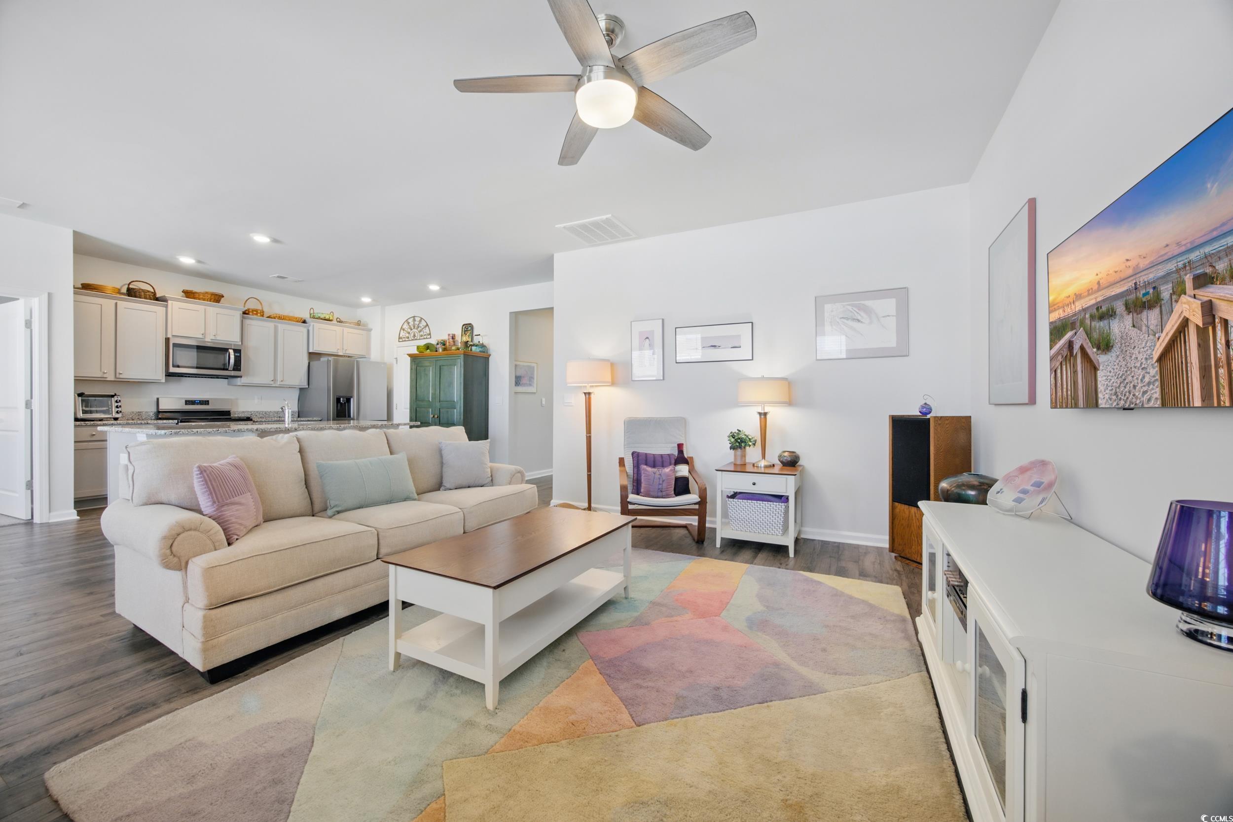 1723 Perthshire Loop Myrtle Beach, SC 29579 - Photo 19 of 34 Living room with ceiling fan, wood finished floors, recessed lighting, and baseboards