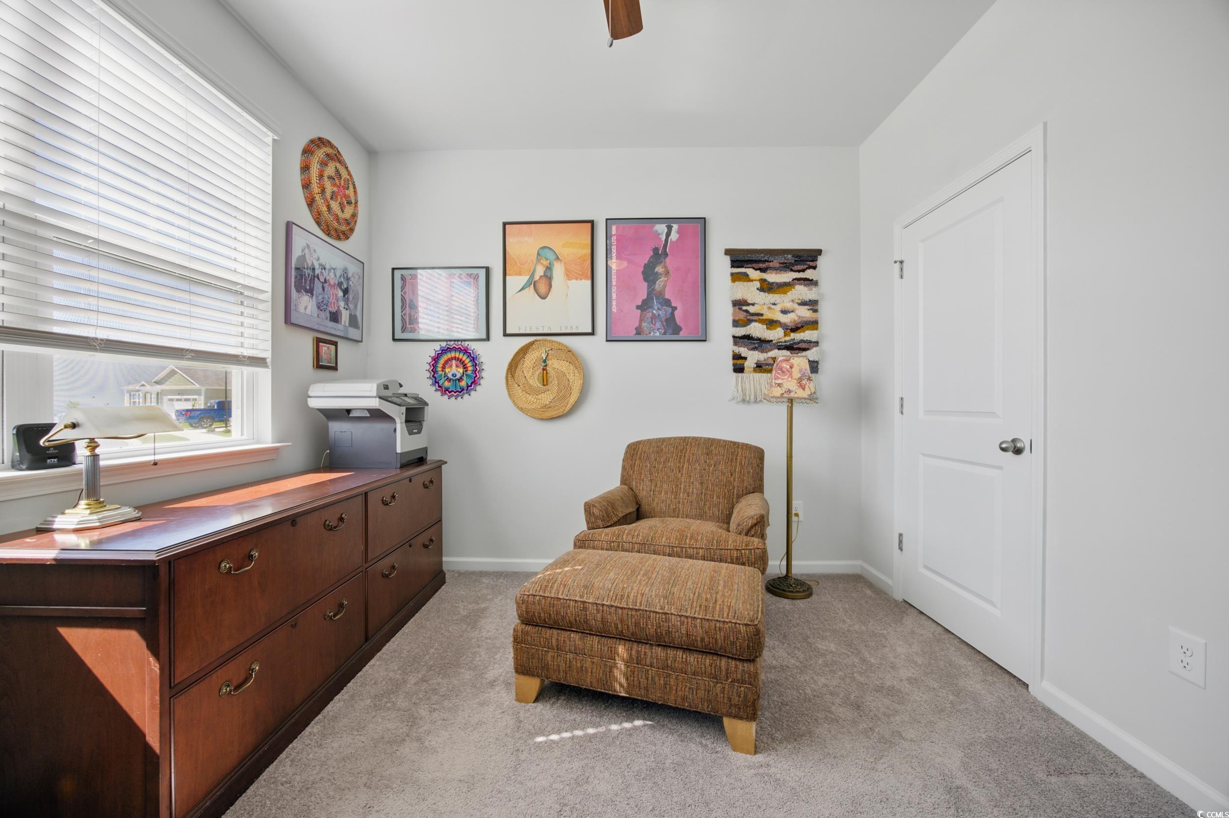 1723 Perthshire Loop Myrtle Beach, SC 29579 - Photo 6 of 34 Living area with light colored carpet, a ceiling fan, and baseboards