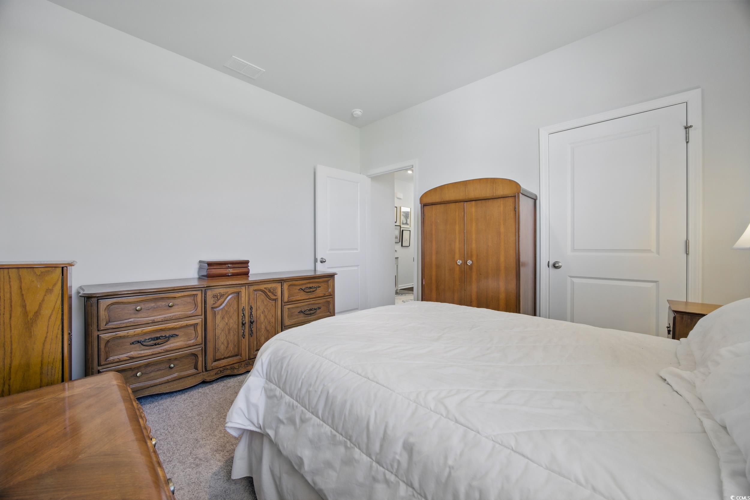 1723 Perthshire Loop Myrtle Beach, SC 29579 - Photo 9 of 34 Bedroom with carpet