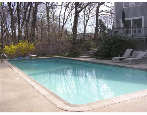 192 East Emerson Road Lexington, MA 02420 - Photo 6 of 16 a view of a swimming pool with a yard