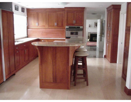 192 East Emerson Road Lexington, MA 02420 - Photo 10 of 16 a kitchen with stainless steel appliances granite countertop a refrigerator and a stove top oven