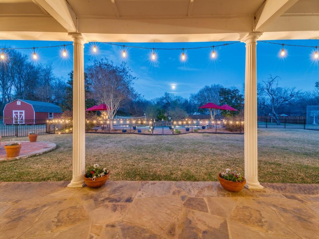 343 East Tripp Road Sunnyvale, TX 75182 - Photo 4 of 36 a view of a patio with table and chairs