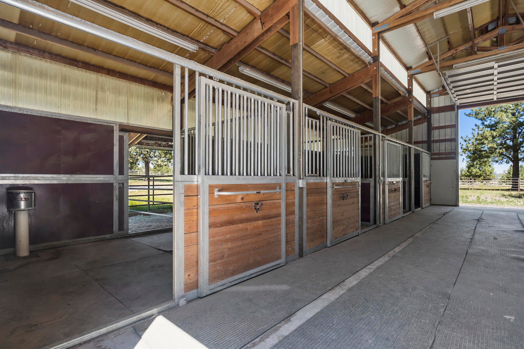 60696 Tekampe Road Bend, OR 97702 - Photo 55 of 61 4 stalls with turnouts, lighting and Nelson automatic waterers