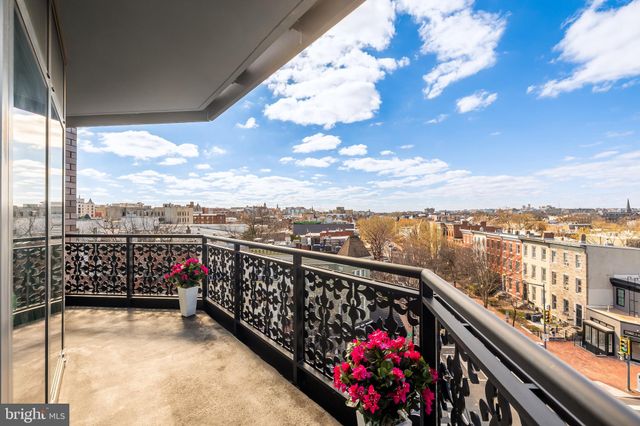 a view of a balcony with city view