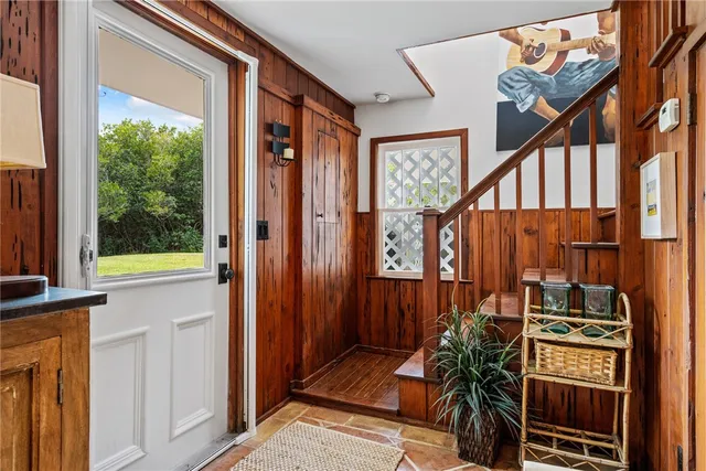 a bathroom with a sink vanity and a mirror