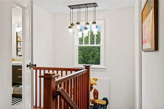 a view of a hallway with washer and dryer