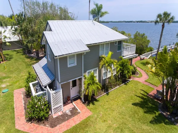 a view of a house with a lake