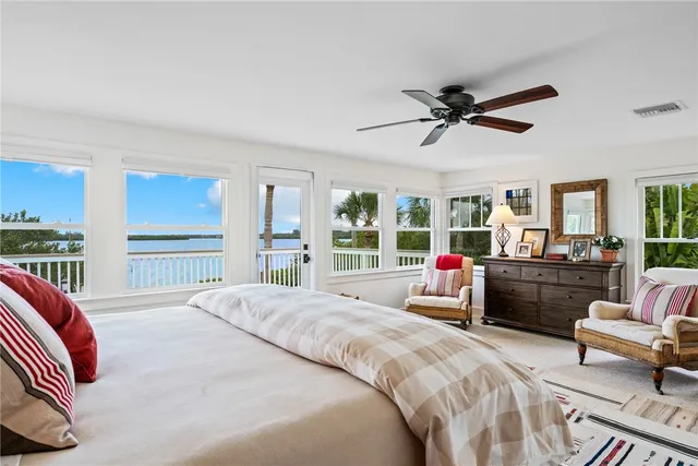 a bathroom with a sink mirror and a shower