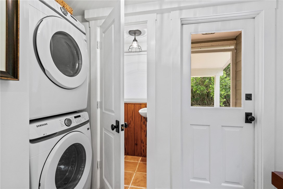 1935 Quay Dock Road Vero Beach, FL 32967 - Photo 28 of 36 a view of a hallway with washer and dryer