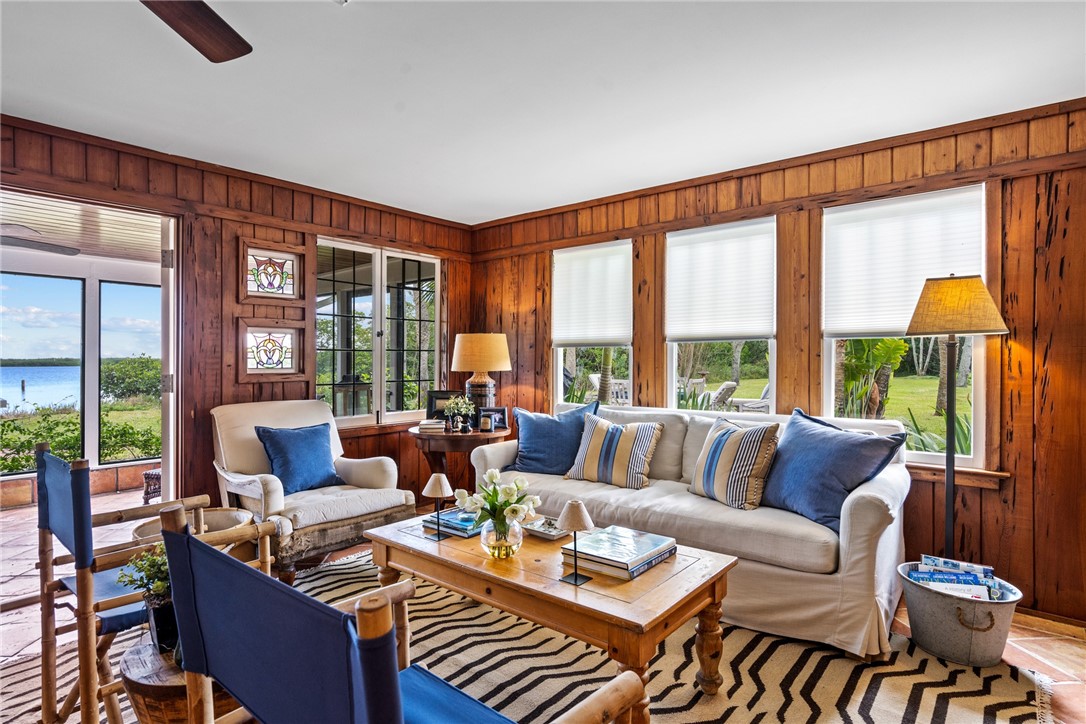 1935 Quay Dock Road Vero Beach, FL 32967 - Photo 10 of 36 a living room with furniture and a large window