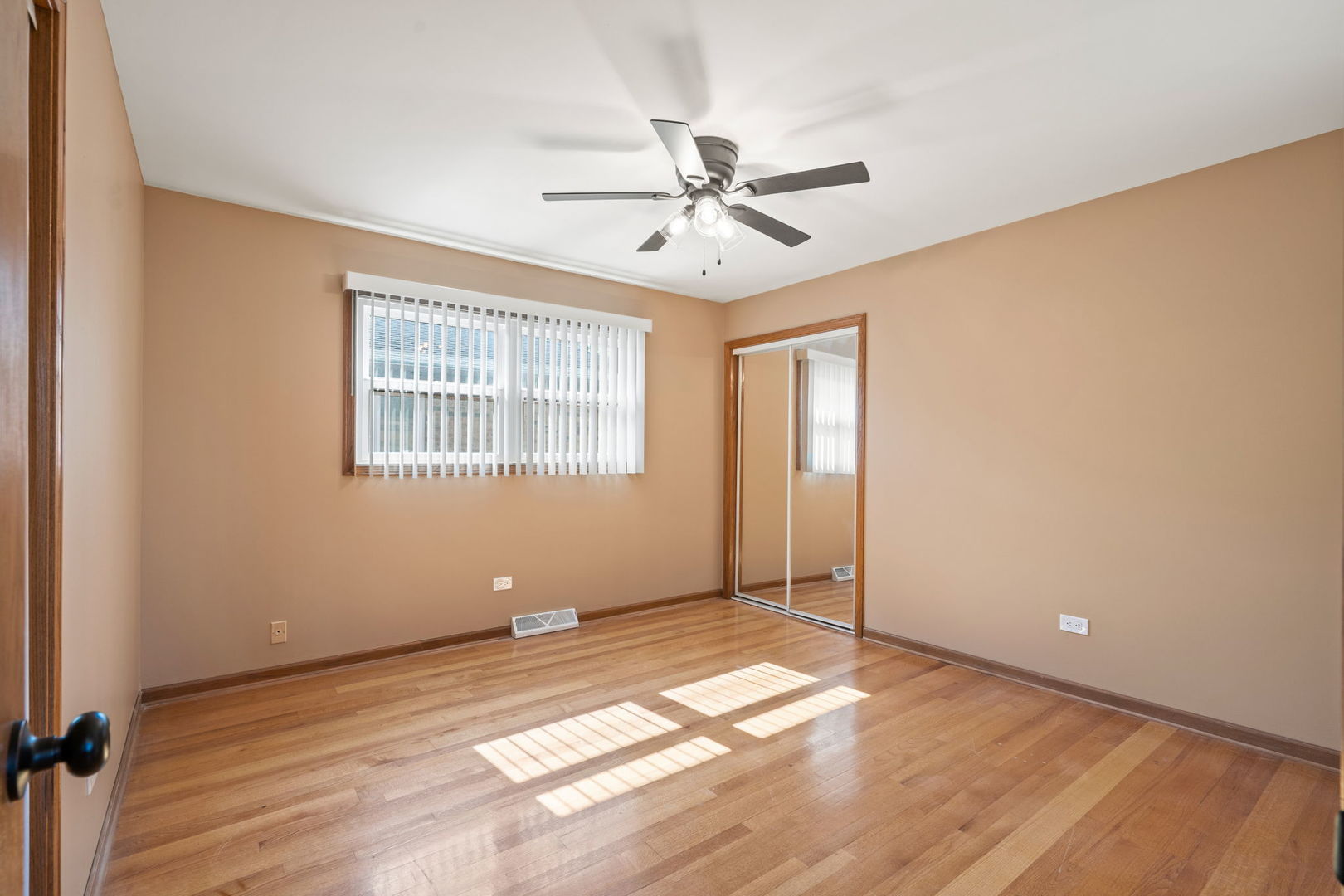 2333 North Trumbull Avenue River Grove, IL 60171 - Photo 11 of 17 a view of a big room with wooden floor and windows