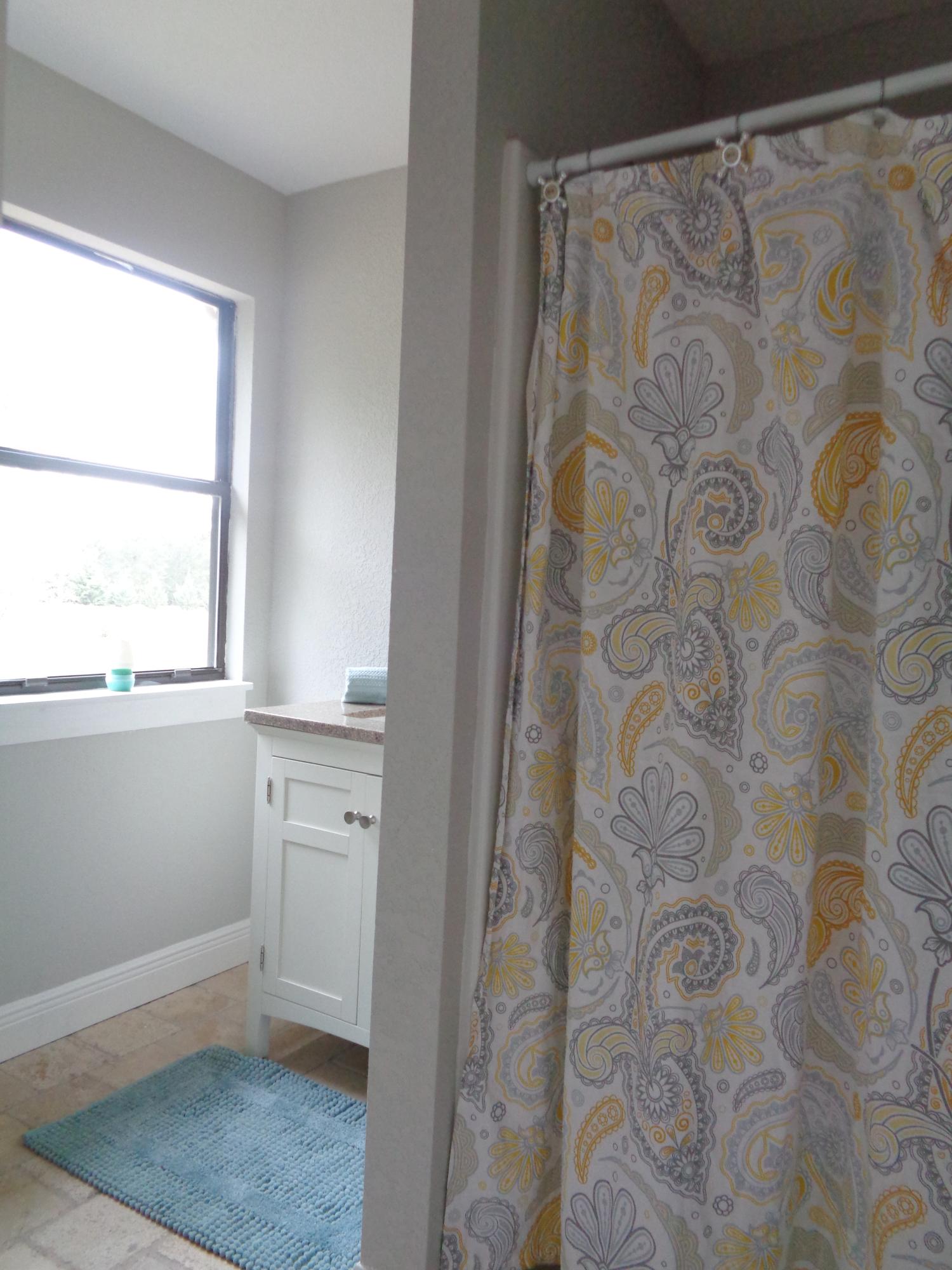 3841 King Lake Road DeFuniak Springs, FL 32433 - Photo 10 of 16 a bathroom with a window and a shower