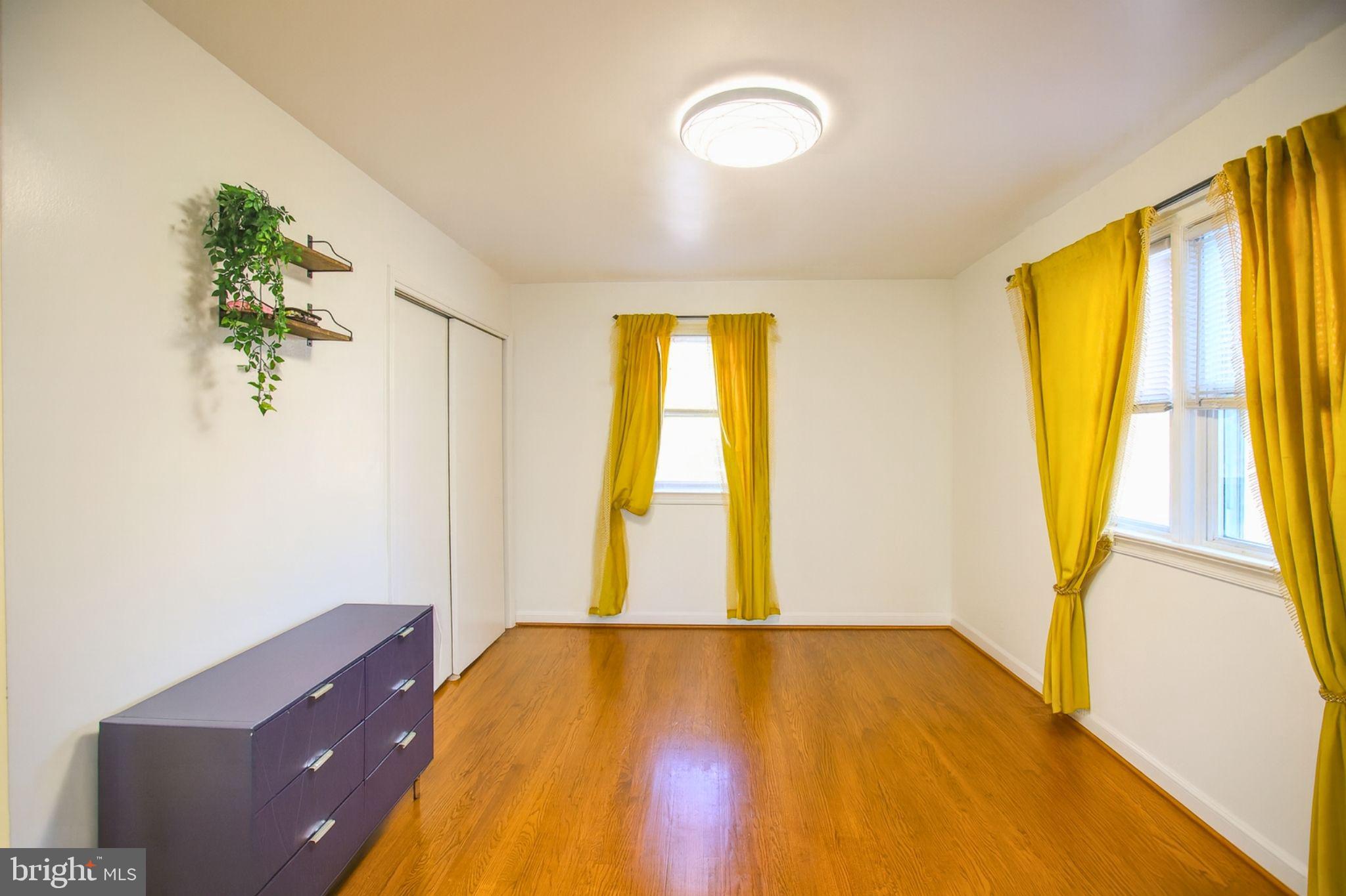 9200 Pine View Lane Clinton, MD 20735 - Photo 15 of 28 a view of a room with wooden floor and windows